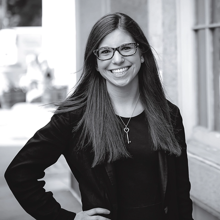 Woman with glasses smiling