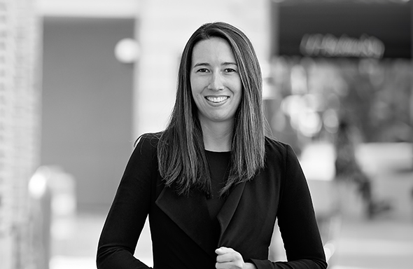 Woman holding on to her blazer