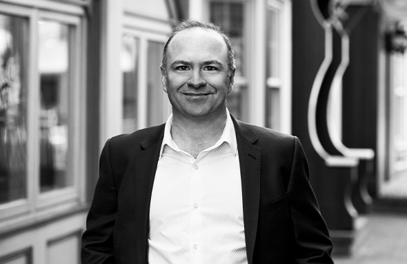 Man standing and smiling