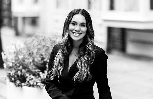 Woman sitting and smiling